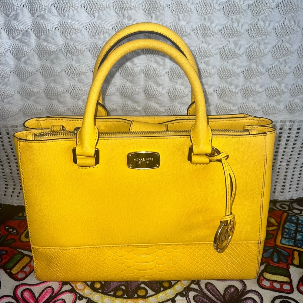 yellow Micheal kors bag with trap